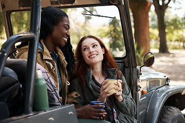 Image showing Friends, coffee or relax on road trip in countryside, talk or travel adventure for leisure in nature. Ladies, drinking and tea in truck on summer holiday, rest and bonding together for chat in texas