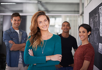 Image showing Businesswoman, smile and office portrait with colleagues, creative and professional career. Leadership, female person and confident with diversity coworkers in collaboration and standing together