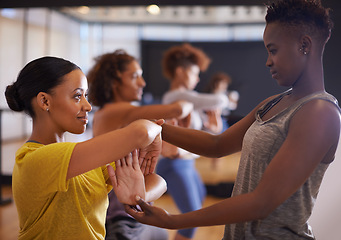 Image showing Dance, fitness and people with instructor in class for wellness, balance and theatre performance. Creative dancer, teacher and women in studio for movement pose, exercise and training for practice