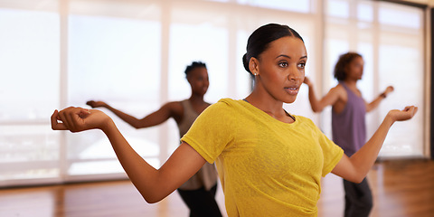 Image showing Dancer, woman and training for learning, exercise and fitness in a dance studio with movement routine. People and performance workout of woman with ballet and wellness in a performing arts class