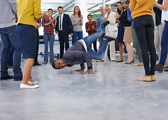 Image showing Breakdance, office and people in celebration for success, teamwork and achievement at startup. Dance, team building and excited staff with applause, smile and happiness in circle with business party