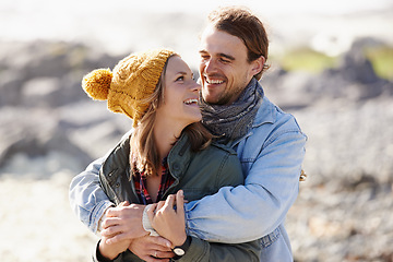 Image showing Hug, nature and couple with love, smile and happiness with weekend break and vacation for honeymoon. Outdoor, romance and embrace with woman and man with sunshine and summer with holiday and romance
