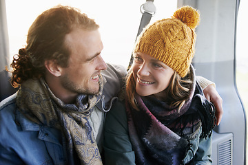 Image showing Couple, hug and smile together in car, travel and bonding with road trip for date or anniversary. Love, trust and commitment with partner, loyalty and cuddle for warmth in winter, vacation and happy