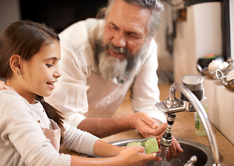 Image showing Grandfather, child and washing hands with water to clean in kitchen, skincare and safety. Mature man, grandchild and liquid for protection against bacteria, learn and hygiene to prepare for cooking