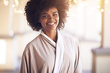 Image showing Spa, woman and portrait with smile in a bathrobe for wellness, cosmetics and beauty treatment. Health, skincare and resort with a relax African female person ready for dermatology at a hotel