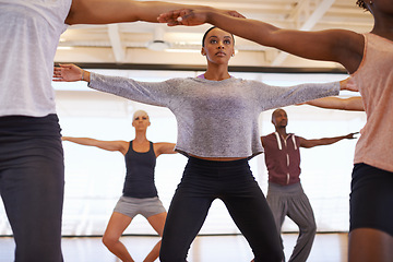 Image showing Dancer, group and stretching at training in studio for workout, exercise or health for wellness. People, friends and together in dancing team for warm up, creative or balance in class, art or ballet