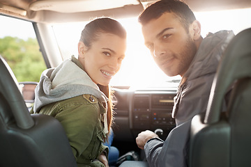 Image showing Couple, smile and portrait in car for road trip, travel or journey in vehicle and outdoor for holiday. Man, woman and happy in seat with radio and jacket for driver, passenger and safety together