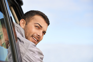 Image showing Road trip, man and window for travel in car, game route and sightseeing for driving adventure in nature. People, traveller or exploration on holiday by blue sky, journey or leisure in vehicle in oman