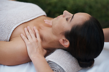 Image showing Spa, woman and hands with massage for wellness at resort, luxury hotel and vacation for relax and therapeutic pamper. People, masseuse or body care with shoulder treatment, hospitality or zen outdoor