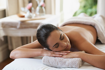 Image showing Spa, treatment and zen woman on massage table, salon and beauty therapist in wellness centre. Peaceful, smile and reflexology for body and relax, pamper and skin care for sleeping female client