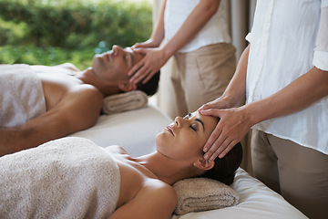 Image showing Facial, head massage and couple in spa to relax on bed for luxury pamper treatment together in hotel. Beauty, hands or zen woman with man at resort or salon for natural healing benefits or skincare