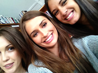 Image showing Women, university student and selfie as friends with smile in library on campus for study break or group work for exam. Classmates, college and leisure with happiness for photo for assignment bonding