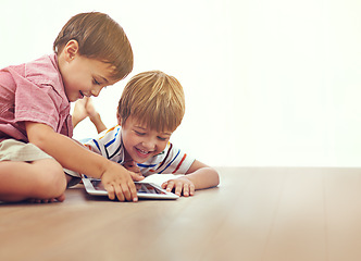 Image showing Family, children and siblings with tablet on a floor for cartoon, gaming or streaming movie at home. Digital, learning and boy kids in house for google it, search or Netflix and chill, app or bonding