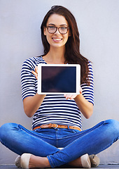 Image showing Young woman, portrait or tablet screen for display or technology on digital app for education by wall background. Student, smile or face with touchscreen for online research or connectivity to learn