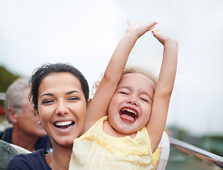 Image showing Woman, child and happy outdoors for travel or journey and bonding together for break and fun on weekend. Mother, daughter or girl on road trip for holiday, smile and laugh for development and care