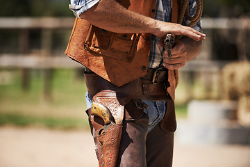 Image showing Cowboy, tough and aim gun to shoot for standoff or gunfight in duel for wild western culture in Texas. Male gunslinger or outlaw, revolver and confrontation for defense or conflict with closeup