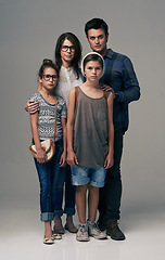 Image showing Parents, kids and together in studio portrait with pride, care and support with love by background. Mother, father and children in group for family, kindness and clothes with trendy fashion for style