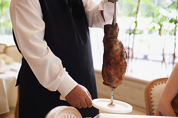 Image showing Waiter, fine dining and meat with service, skewer and restaurant for dinner or lunch. Person, food and luxury with gourmet, meal and expensive cuisine with beef or protein on stake at elegant diner