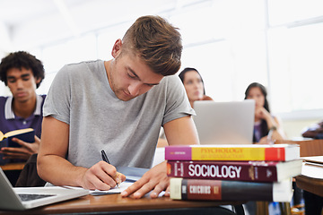 Image showing Student, man and writing with textbooks, education and university with exams and research for test. Person, college and guy with ideas or laptop with inspiration or studying with learning or deadline