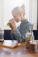 Image showing Woman, brewing and home with herbal tea in kitchen with plunger, jug and ingredients for healthy and warm beverage. Home herbs, morning and fresh to taste, drink and enjoy before day at work.