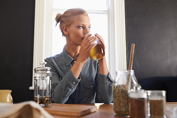 Image showing Morning, herbal tea and woman in kitchen relaxing at home with happy ideas and excited for future. Healthy, calm mindset and girl with drink on holiday, vacation or wellness in apartment mockup