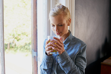 Image showing Relax, smelling and woman with coffee in a house for morning drink, caffeine or comfort beverage in her home. Tea, aroma and female person chilling in a living room of day off, weekend or vacation