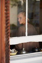 Image showing Portrait, woman and smile by window for relax with reflection, weekend break and calm expression in home. Person, face and happy with confidence, pride and casual clothes in apartment in winter