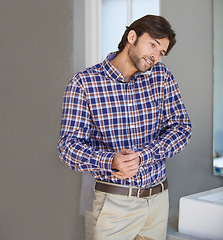 Image showing Phone, planning and man with call in the morning ready to start the day with dressing routine. Communication, mobile and businessman at home with networking conversation, job and tech in a bathroom