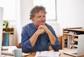 Image showing Senior, businessman and thinking with laptop, documents or paperwork for budget planning or finance at office. Mature man, accountant or employee with smile in wonder or thought for financial success