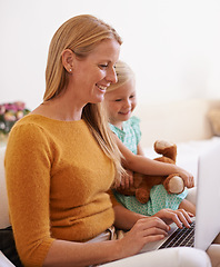 Image showing Happy mother, child and relax with laptop on sofa for online entertainment, social media or networking at home. Mom, kid or daughter with smile on technology for streaming or subscription at house