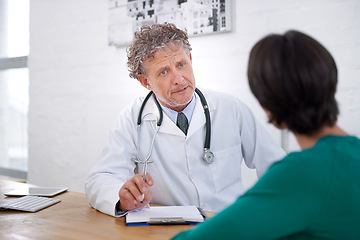Image showing Medical, consultation and mature doctor with a checklist for healthcare, insurance or results of test. Clinic, patient and man in discussion of surgery or exam and professional paperwork for hospital