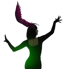 Image showing Woman, feather and head for fashion in studio for fantasy or magic with unique creativity for art or illusion. Female person, isolated and white background for designer clothes, diva and surreal