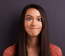 Image showing Woman, funny face and studio for comedy expression as mockup space, grey background or humor. Female person, model and crazy emoji as meme for comic reaction with goofy good mood, carefree or squint