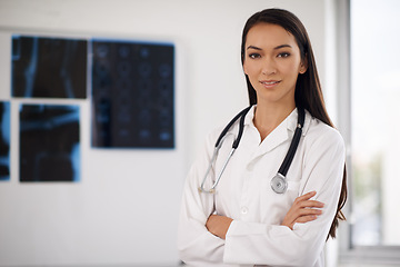 Image showing Portrait, confident doctor and woman in hospital for healthcare, wellness or xray in Brazil. Face, medical professional and employee with arms crossed, worker or radiology expert with pride in clinic