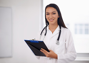 Image showing Portrait, happy doctor and woman writing on checklist in hospital for healthcare, wellness and notes in Brazil. Face, medical professional and employee with clipboard, worker and smile of expert