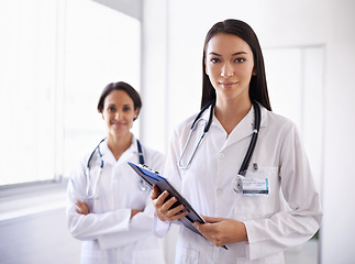 Image showing Portrait, doctors and leader with medical team in hospital for health checklist in clinic. Face, women and surgeon with arms crossed in collaboration for wellness, cooperation or confidence together