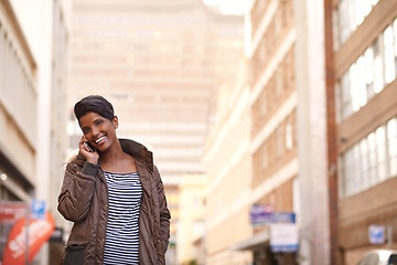 Image showing Phone call, smile and black woman in a city, conversation and New York with communication and network. Person, outdoor or girl with happiness or walking with cellphone and digital app with connection