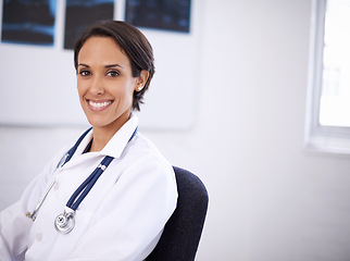 Image showing Portrait, doctor and happy woman in hospital for healthcare, wellness or service of surgeon in Brazil. Face, medical professional or smile of employee, worker or radiology expert in clinic for career