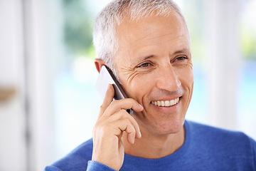 Image showing Senior, man and face with phone call in home with laughing for funny conversation, discussion and mobile chat. Elderly, person and happy with smartphone for talking, comic joke and mockup space