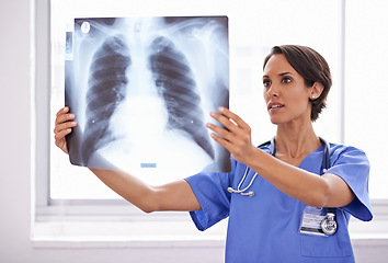 Image showing X ray, hospital and woman doctor thinking of healthcare research, problem solving and review of skeleton and lung problem. Radiology professional, medical worker or surgeon with analysis or checking