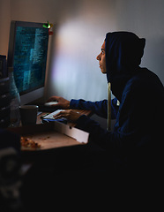 Image showing Night, hacker or man with computer, tech or typing with server or programmer with nerd or geek. Person, home or guy with pc or online reading with dark room or cyber security with network or internet