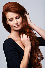 Image showing Hair, woman and studio or health for growth treatment, keratin and highlights in hairstyle. Happy female person, redhead and collagen wellness, natural beauty on model and isolated white background