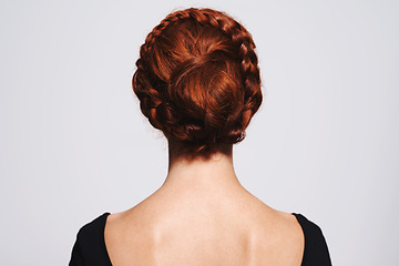 Image showing Woman, haircare and hairstyle with redhead in studio on white background with satisfied look and confidence. Back view, female person and routine with natural hair, repair and fresh with treatment