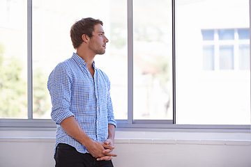 Image showing Window, thinking and business with man, decision and choice with planning and problem solving. Person, professional and entrepreneur with view and startup with solution and sunshine with questions