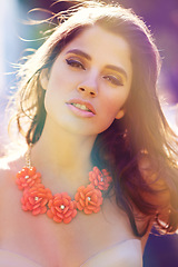 Image showing Beauty, woman and portrait in outdoor with cosmetics, foundation and accessories or jewellery for event. Young lady, face and make up with eyeliner and flower necklace and summer celebration in city