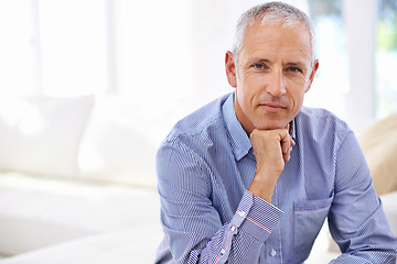 Image showing Senior, man and portrait for relax on sofa with thinking, retirement and wellness in living room. Elderly, person and face with idea, confidence or problem solving in lounge of home with mockup space