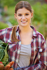 Image showing Happy woman, portrait and harvester with vegetables for farming or harvest of crops and nature resources. Female person with smile holding organic plants or veg in natural growth for fresh produce