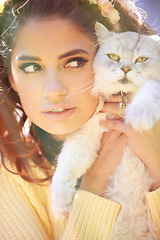 Image showing Woman, cat and hug outdoors for comfort, pet care and holding for affection outside. Female person, animal and embrace for bonding on vacation or holiday, love and companion for support in closeup
