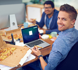 Image showing Businessman, portrait and eating by laptop in office with happiness for lunch break, pizza and coworking company. Programmer, employee and face or smile with fast food, coding team or screen at desk
