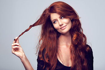 Image showing Beauty, face and hair with redhead woman in studio on gray background for natural cosmetic treatment. Skincare, thinking and wellness with happy model at salon for shampoo or keratin haircare